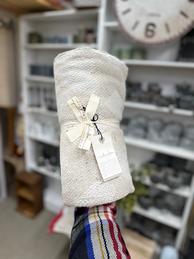 Oatmeal and white throw